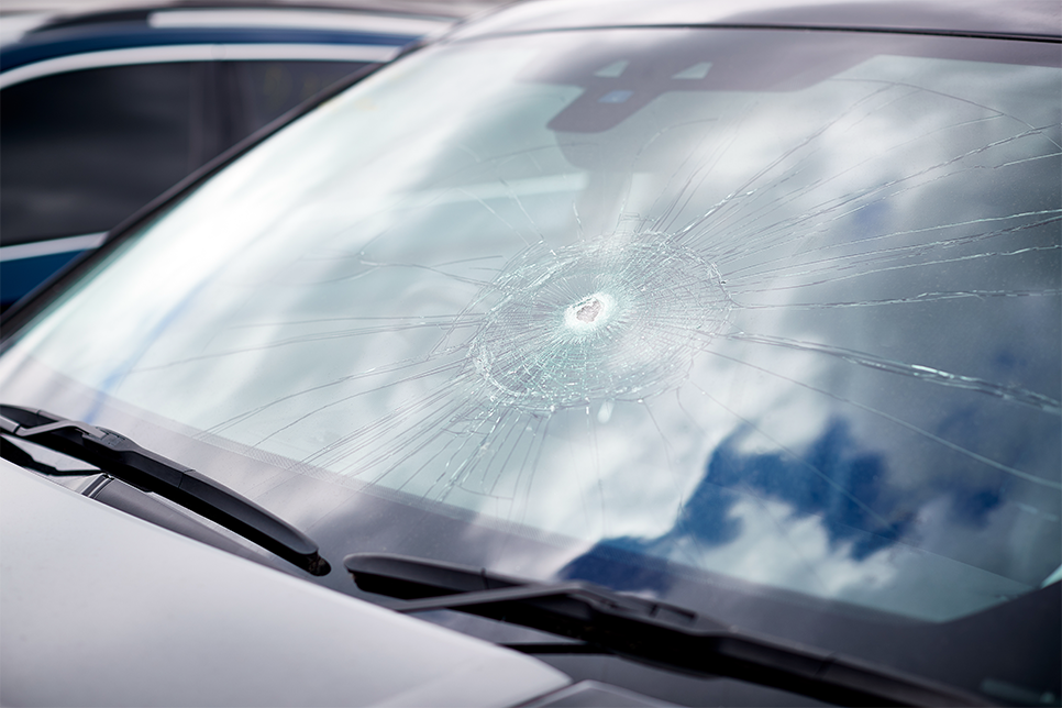 a car windshield with a large crack
