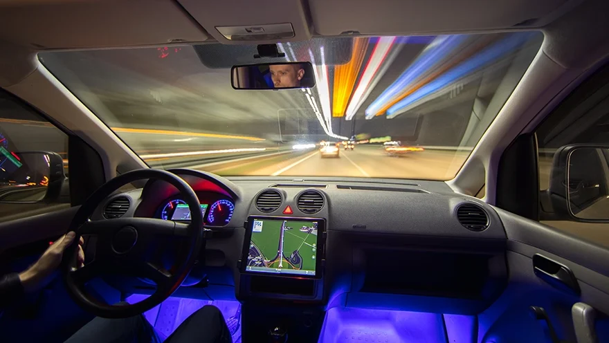 man driving a vehicle equipped with ADAS