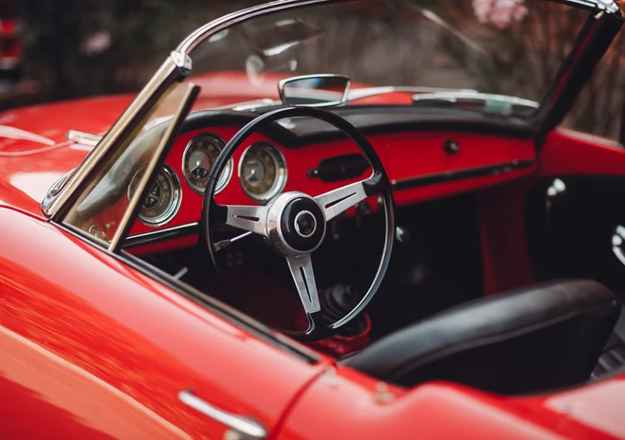 a red classic car