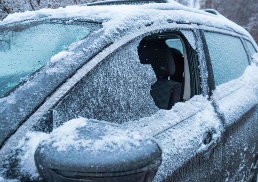 a broken window on a driver's car door