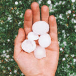 large hailstones in a man's hand