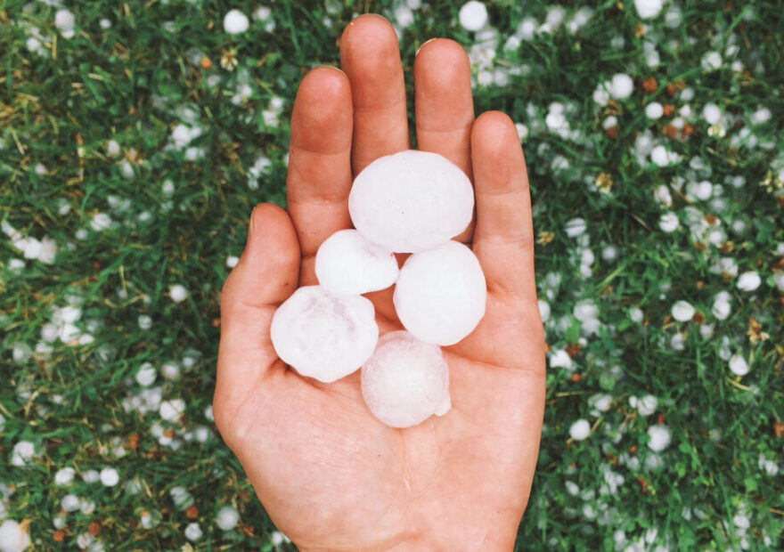 large hailstones in a man's hand