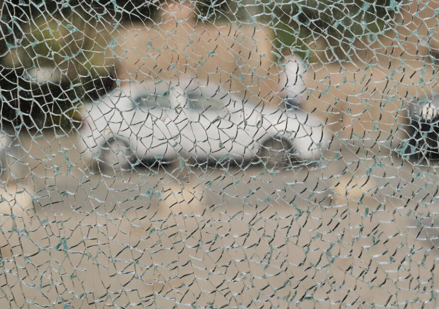 looking through a shattered car window